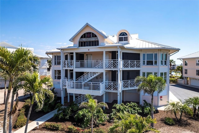 view of property featuring stairs