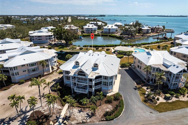 drone / aerial view with a water view