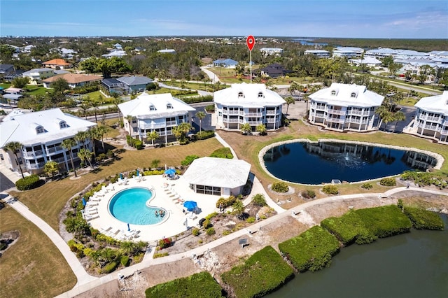 birds eye view of property featuring a water view