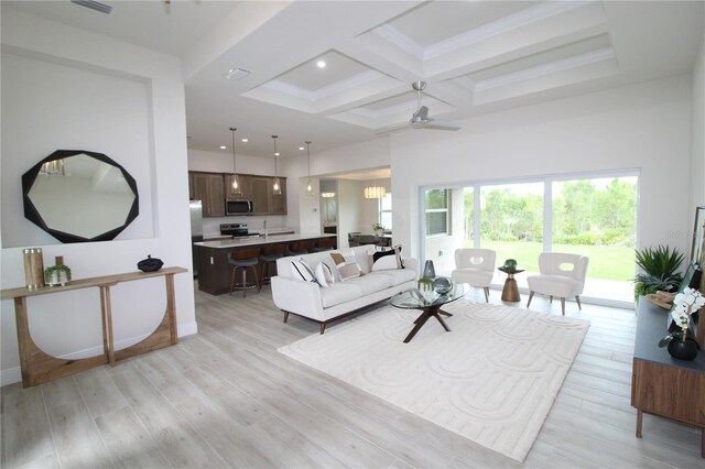 9529 Calumet Blvd, Port Charlotte, FL 33981 - living room with beamed ceiling, light wood-style flooring, coffered ceiling, recessed lighting, and ceiling fan