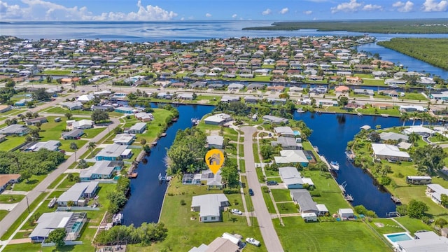 aerial view with a residential view and a water view