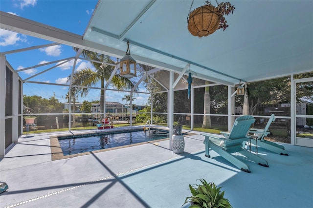 pool featuring a patio area and a lanai