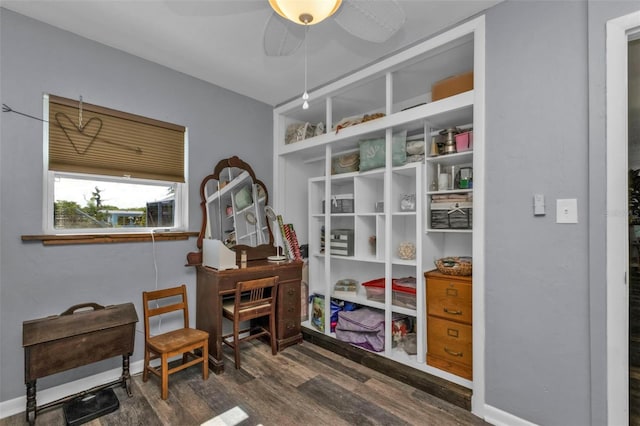 sitting room featuring ceiling fan and wood finished floors