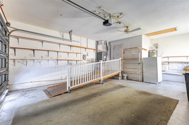 garage featuring ceiling fan and a garage door opener