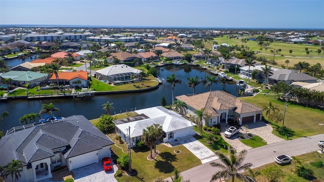 bird's eye view featuring a residential view and a water view