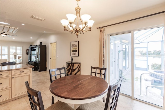 dining area featuring visible vents, recessed lighting, light tile patterned floors, a chandelier, and vaulted ceiling