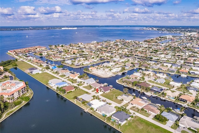 aerial view featuring a residential view and a water view