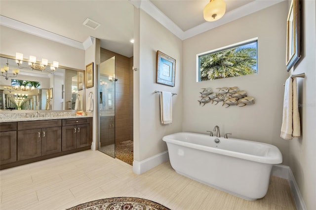 bathroom with vanity, crown molding, a tile shower, and a freestanding bath