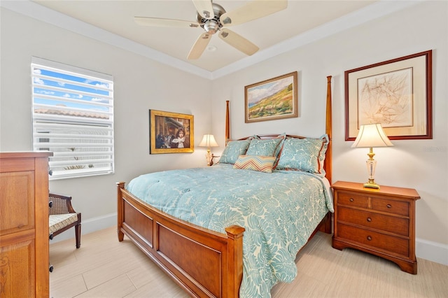 bedroom featuring baseboards, a ceiling fan, and crown molding