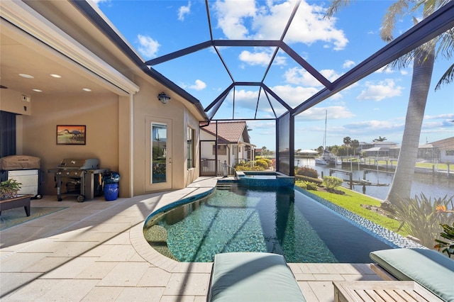 view of swimming pool featuring a water view, area for grilling, a pool with connected hot tub, a lanai, and a patio area
