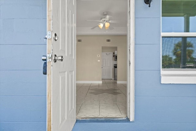 property entrance with visible vents