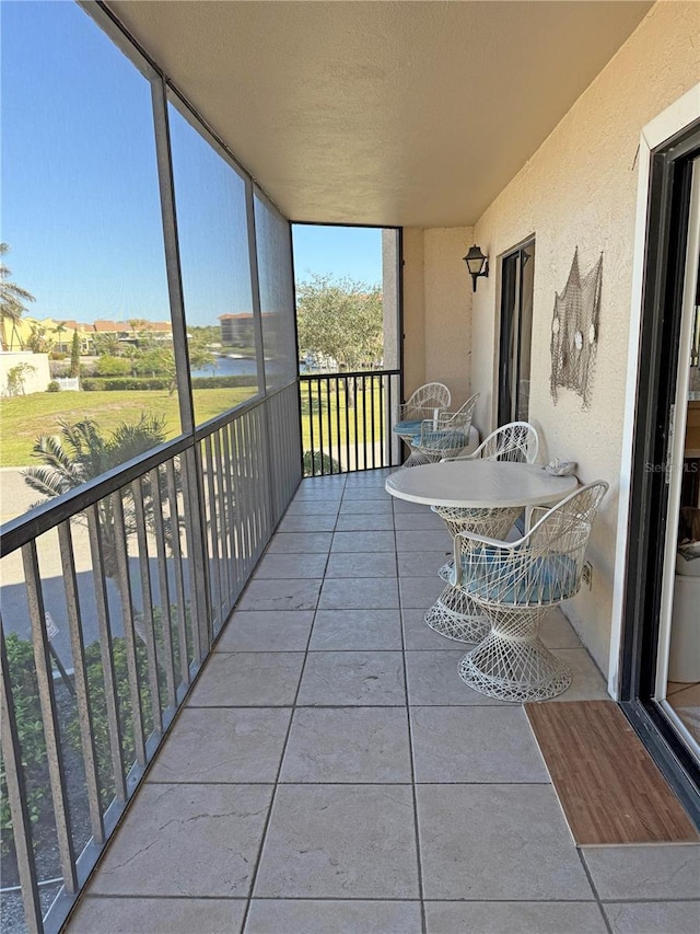 balcony with outdoor dining area