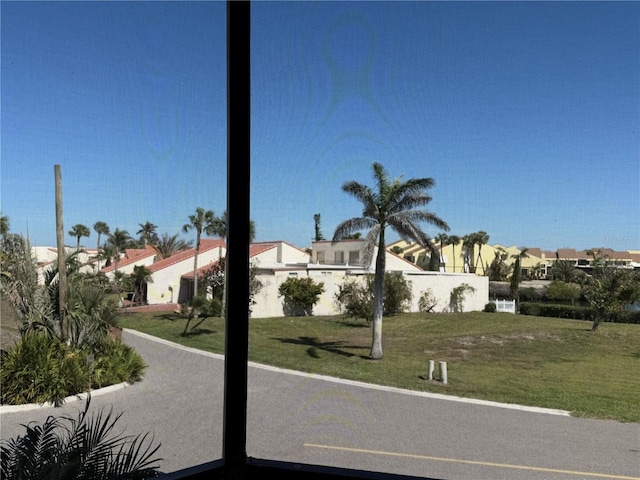 view of road with a residential view