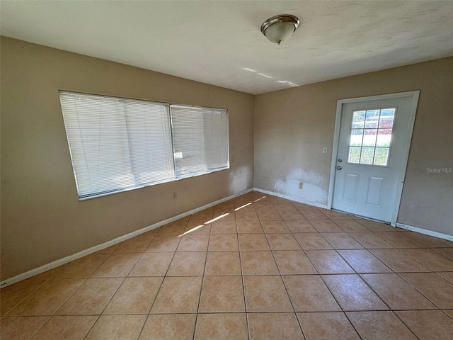 30147 Holly Rd, Punta Gorda, FL 33982 - interior space with baseboards and light tile patterned floors