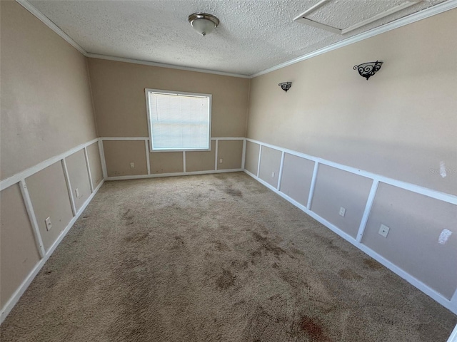 30147 Holly Rd, Punta Gorda, FL 33982 - carpeted empty room with wainscoting, a decorative wall, ornamental molding, and a textured ceiling