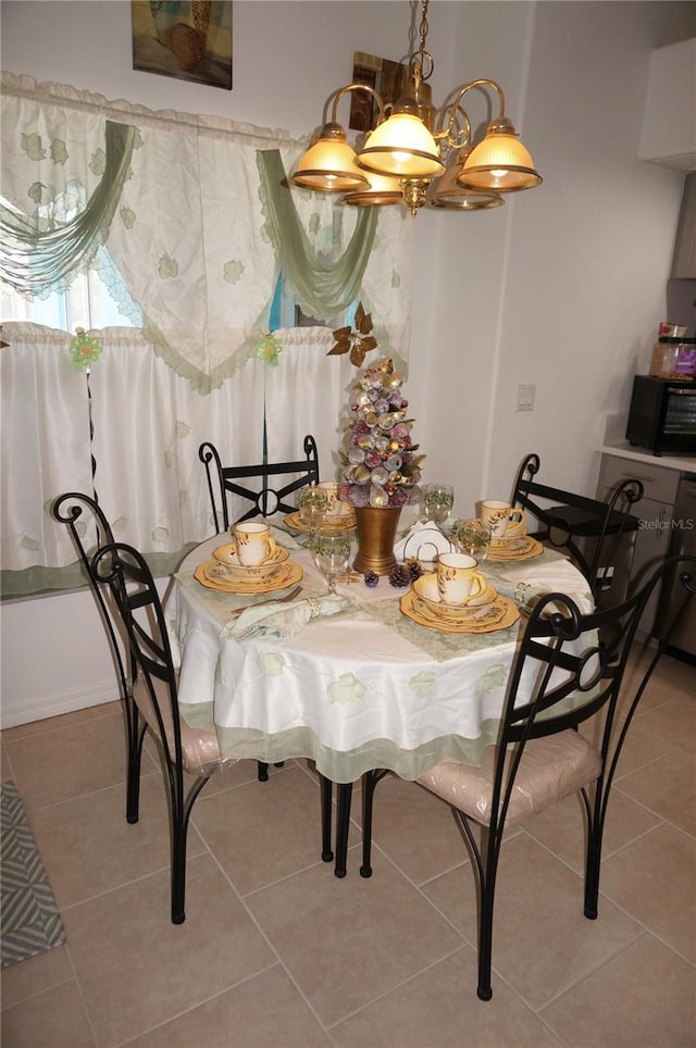 dining room with tile patterned floors