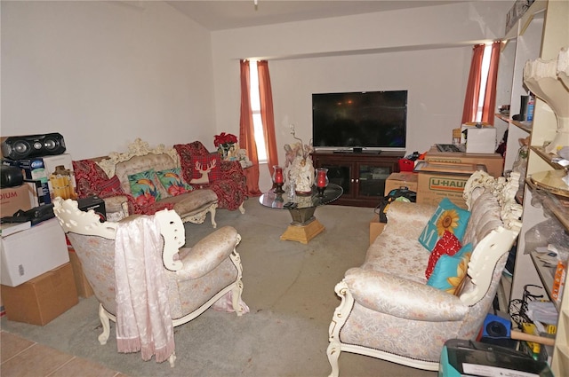 living room featuring decorative columns