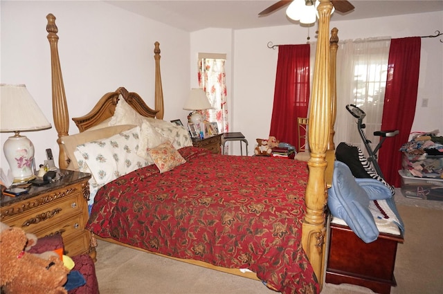 carpeted bedroom with a ceiling fan