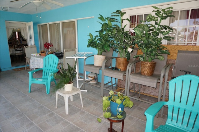 view of patio with visible vents and a ceiling fan