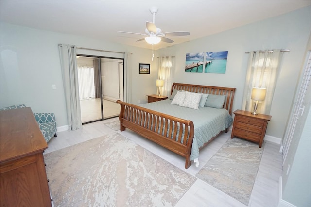 bedroom with baseboards, ceiling fan, and access to outside