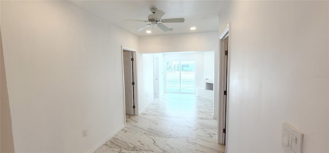 3372 Elkcam Blvd, Port Charlotte, FL 33952 - hall with recessed lighting, marble finish floor, and baseboards