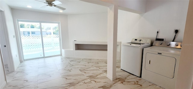3372 Elkcam Blvd, Port Charlotte, FL 33952 - laundry area with marble finish floor, separate washer and dryer, baseboards, ceiling fan, and laundry area