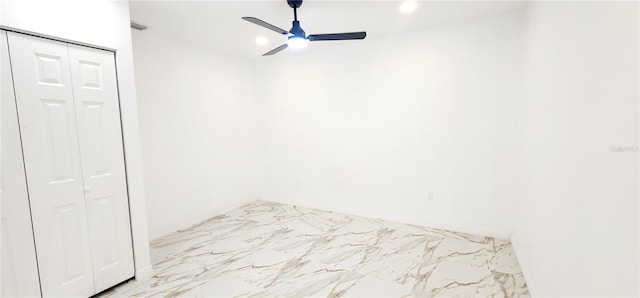 3372 Elkcam Blvd, Port Charlotte, FL 33952 - unfurnished bedroom with a closet, visible vents, marble finish floor, and a ceiling fan