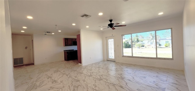 3372 Elkcam Blvd, Port Charlotte, FL 33952 - unfurnished living room with visible vents, marble finish floor, and a ceiling fan