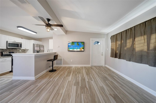 unfurnished living room featuring visible vents, baseboards, light wood-type flooring, and ceiling fan