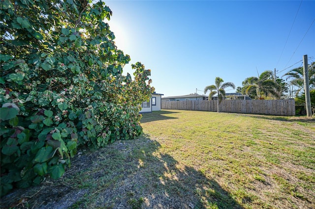 view of yard featuring fence