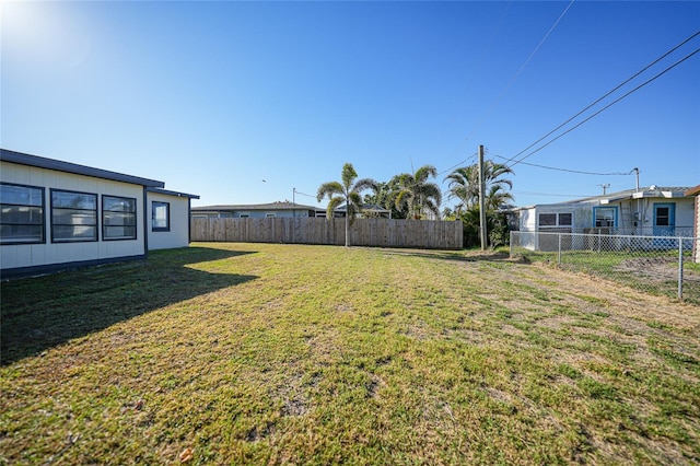 view of yard featuring a fenced backyard