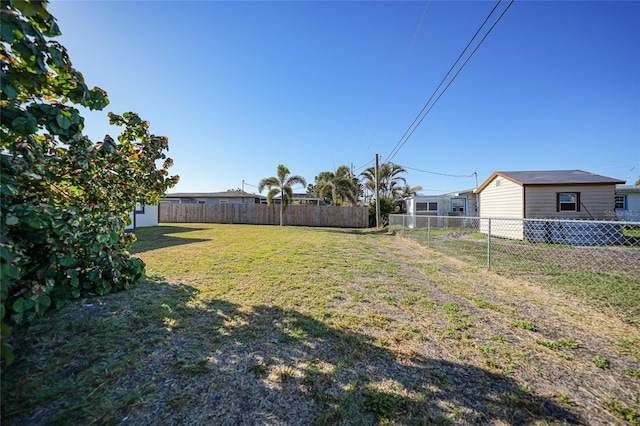 view of yard featuring a fenced backyard