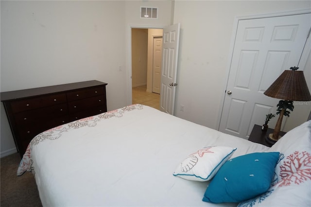bedroom featuring visible vents