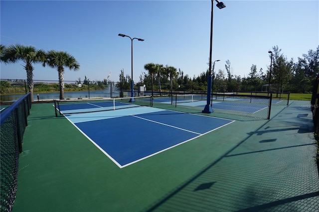 view of sport court with community basketball court and fence
