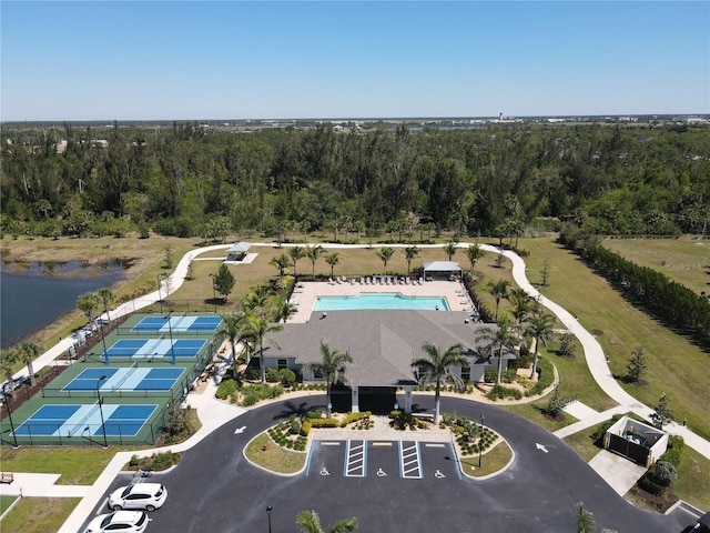 aerial view featuring a wooded view