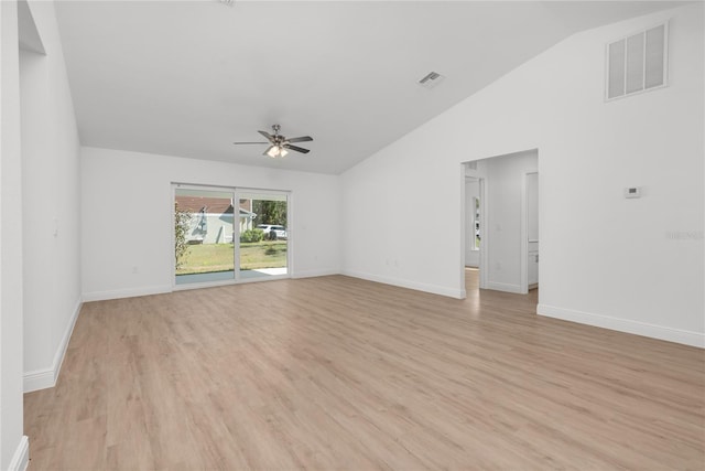 111 Swan Dr, Rotonda West, FL 33947 - spare room with ceiling fan, vaulted ceiling, light wood-type flooring, and baseboards