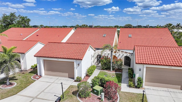 5036 San Rocco Ct, Punta Gorda, FL 33950 - mediterranean / spanish house with stucco siding, a tiled roof, and concrete driveway