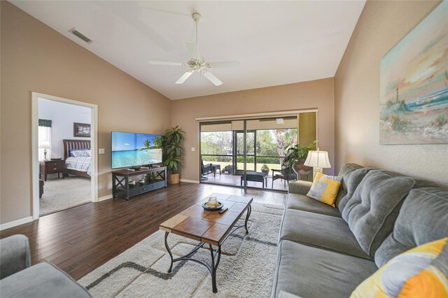 5036 San Rocco Ct, Punta Gorda, FL 33950 - living room featuring visible vents, baseboards, wood finished floors, high vaulted ceiling, and a ceiling fan