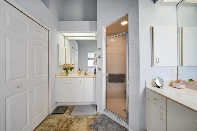 5036 San Rocco Ct, Punta Gorda, FL 33950 - bathroom with vanity and a shower stall