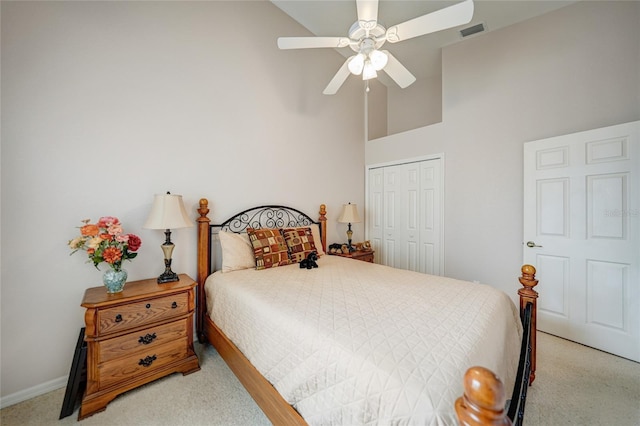 5036 San Rocco Ct, Punta Gorda, FL 33950 - carpeted bedroom with baseboards, visible vents, high vaulted ceiling, ceiling fan, and a closet