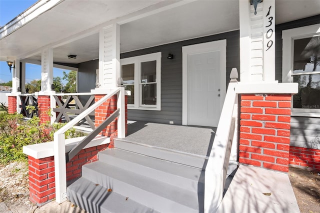 property entrance with a porch