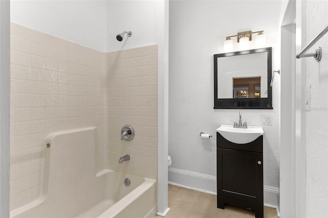 bathroom with vanity, bathing tub / shower combination, toilet, and baseboards