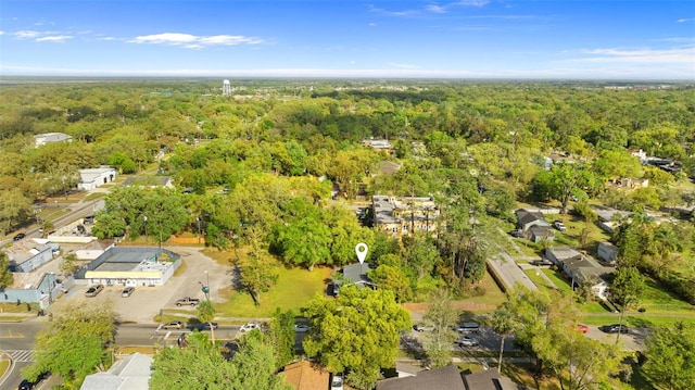 drone / aerial view with a view of trees