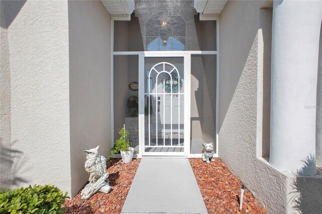 1701 Lastingham Ln, Port Charlotte, FL 33980 - entrance to property featuring stucco siding