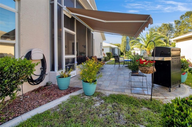 1701 Lastingham Ln, Port Charlotte, FL 33980 - view of patio / terrace featuring a grill
