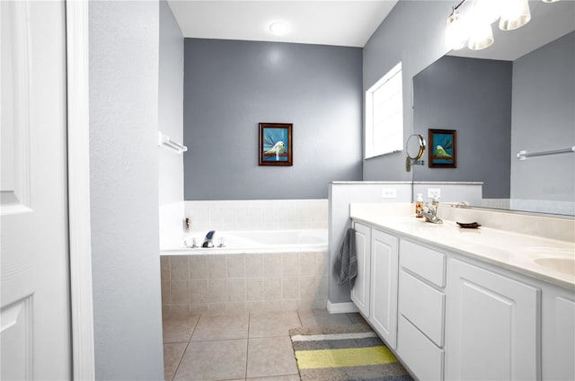 1701 Lastingham Ln, Port Charlotte, FL 33980 - full bathroom featuring tile patterned floors, a garden tub, double vanity, and a sink