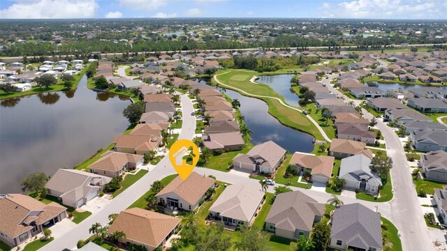 1701 Lastingham Ln, Port Charlotte, FL 33980 - aerial view featuring a residential view and a water view