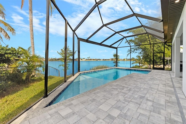 2716 SW 13th Ave, Cape Coral, FL 33914 - outdoor pool with a patio area, glass enclosure, and a water view