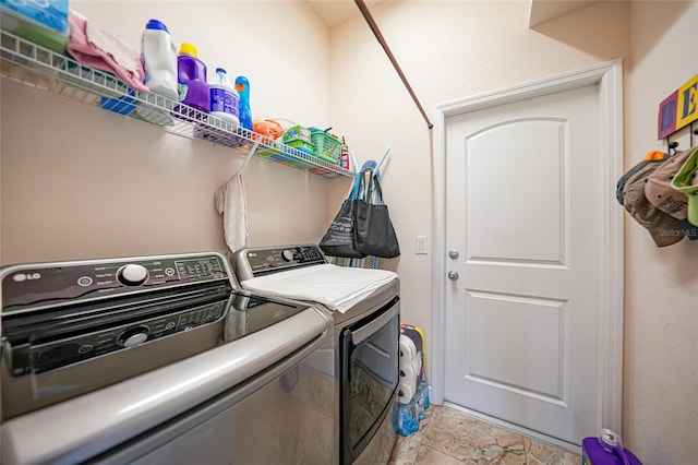 laundry area featuring laundry area and independent washer and dryer