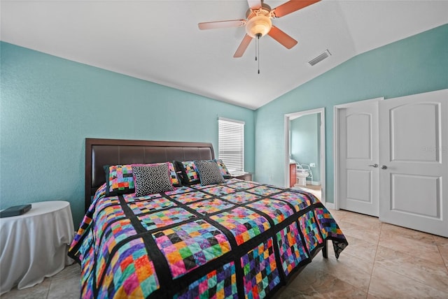 bedroom featuring vaulted ceiling, a ceiling fan, and visible vents
